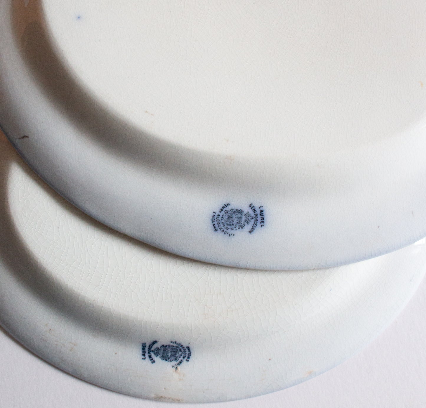 Henry Alcock & Co. Ltd. Semi Porcelain 'Laurel' Pattern Blue and White Transferware Graduated Platters (2)