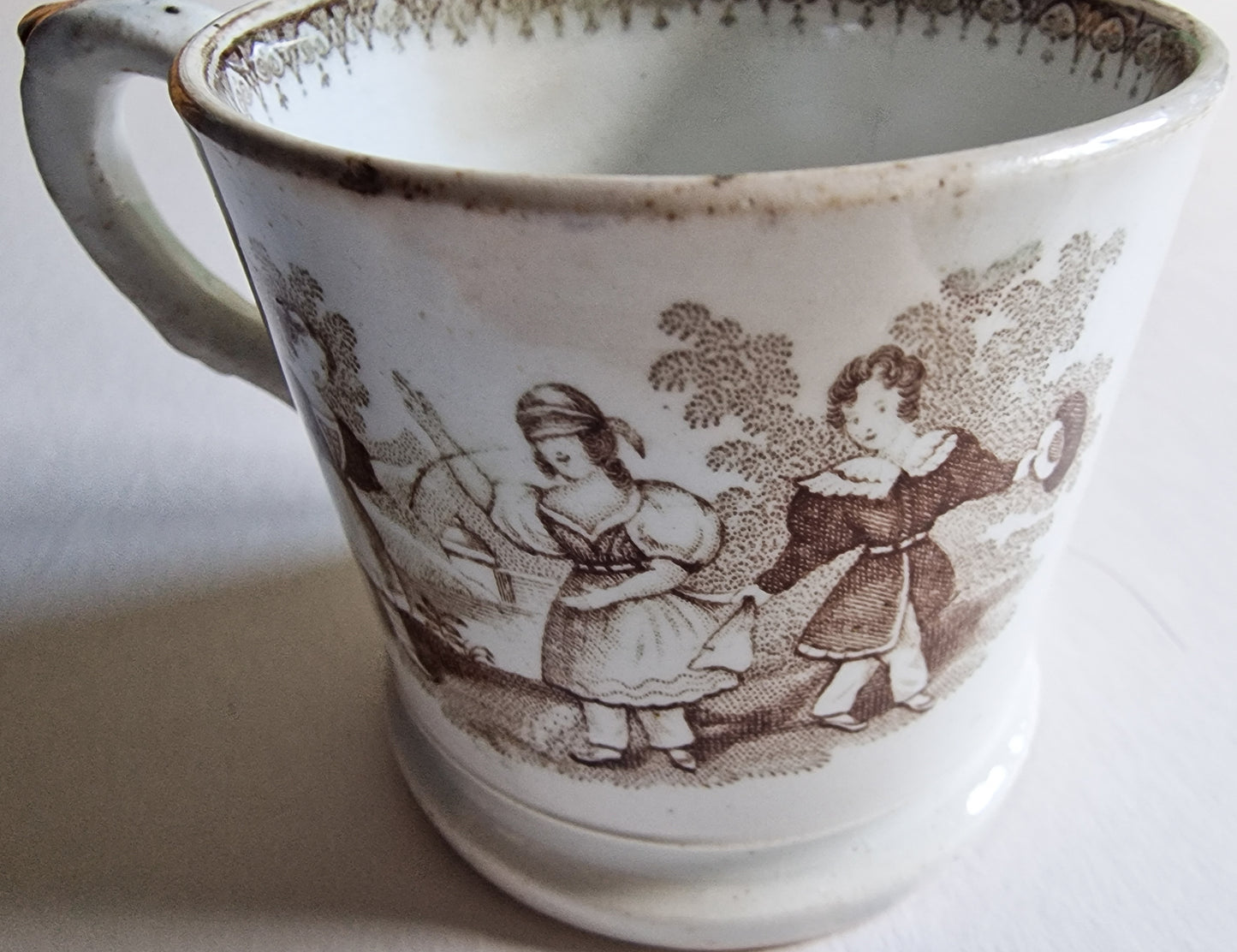 Antique English Pearlware Pottery Child's Mug with Nursery Game Detail