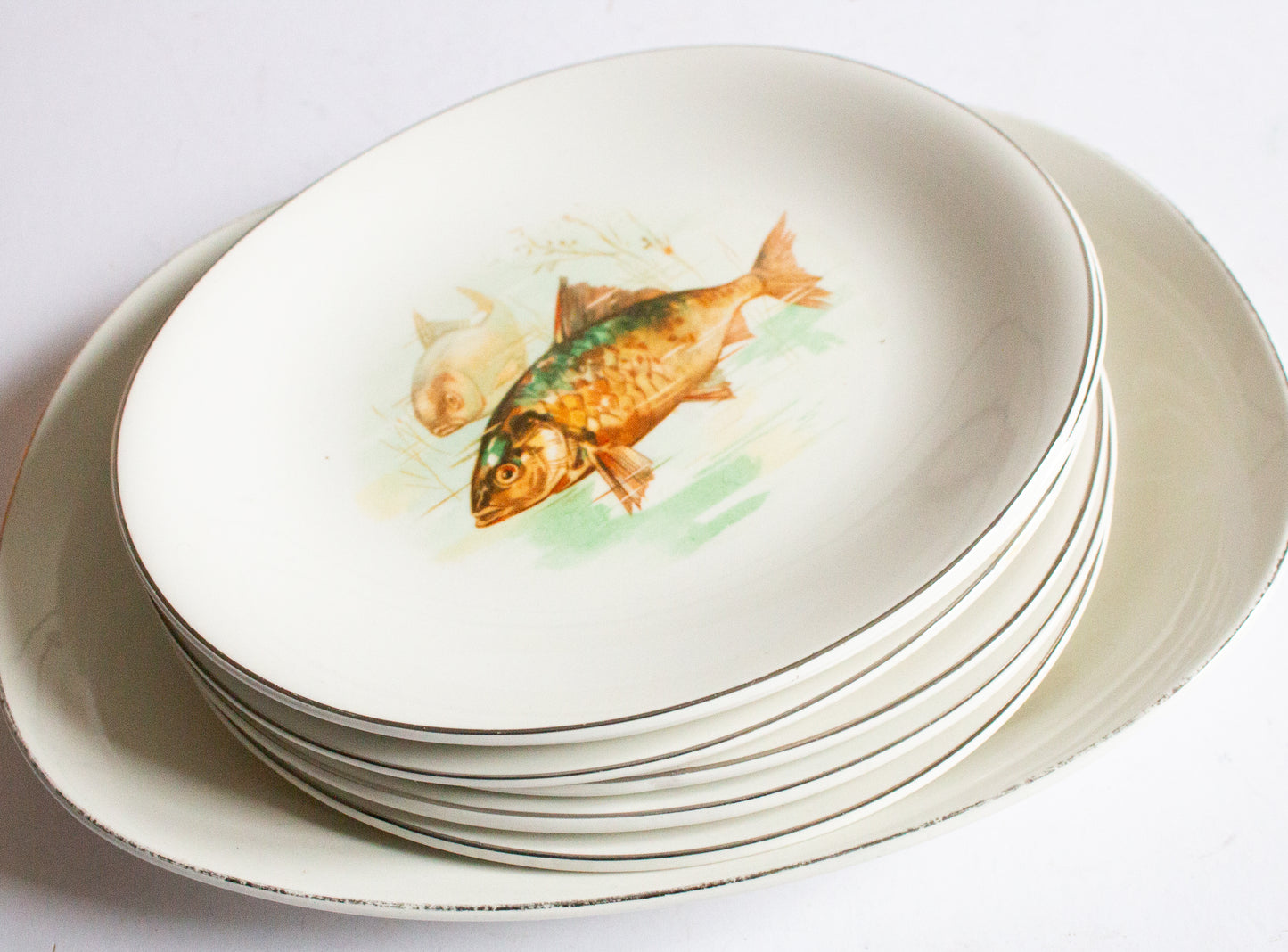 Wedgwood & Co. Ltd. England  Plates for Six and Serving Plate with Central Fish Motifs