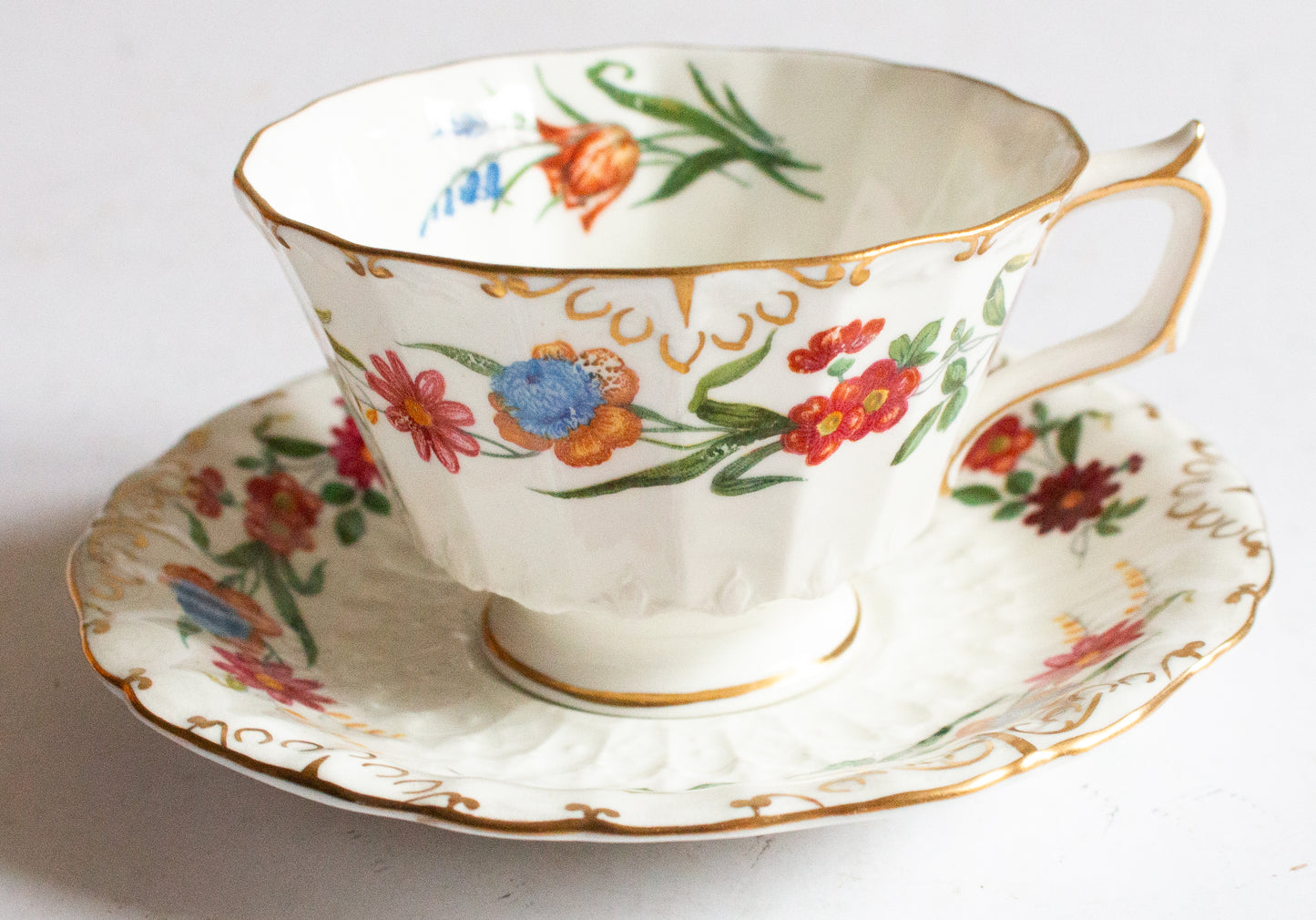 Royal Crown Derby 'Chatsworth' Pattern Floral Teacup and Saucer