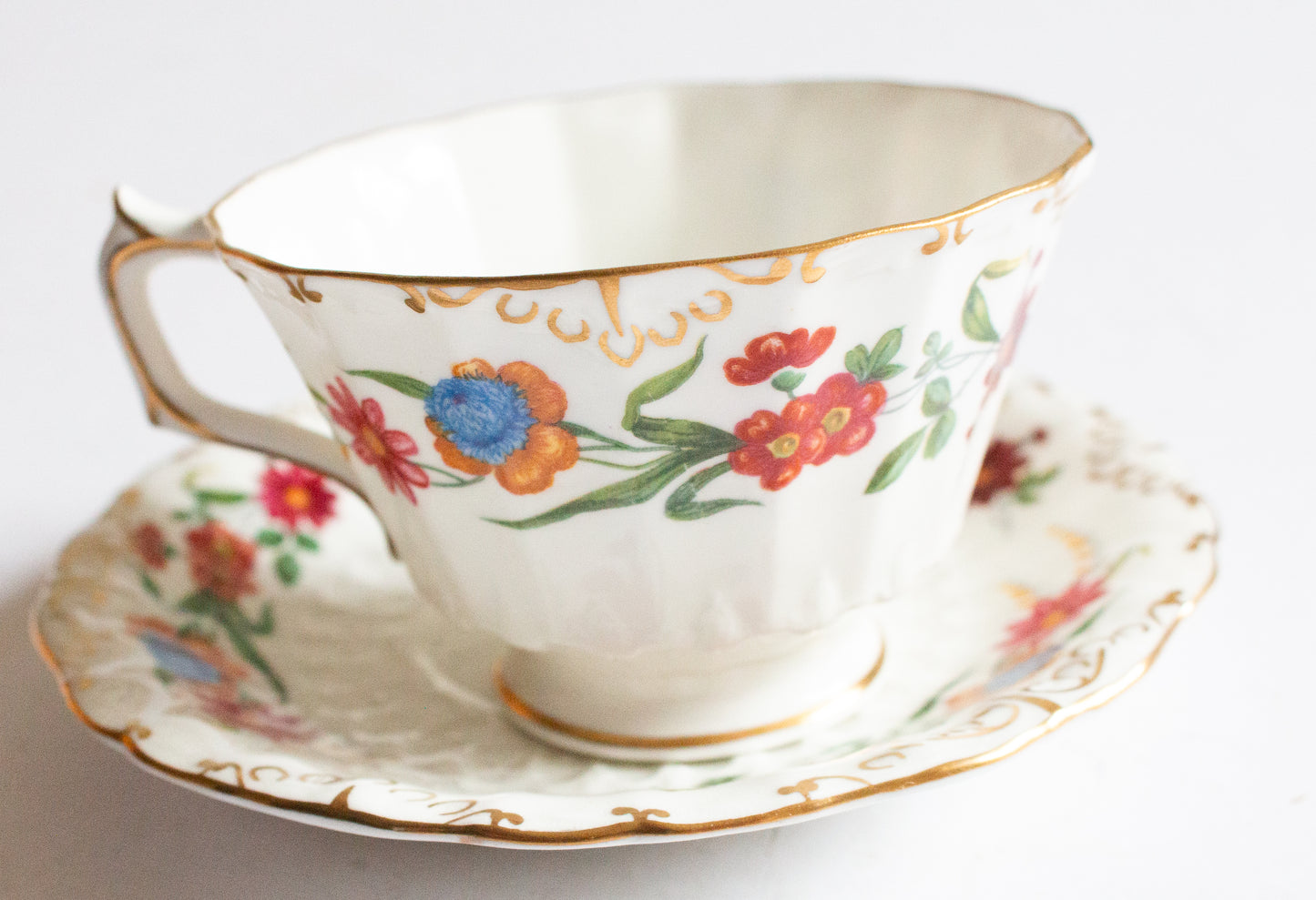 Royal Crown Derby 'Chatsworth' Pattern Floral Teacup and Saucer
